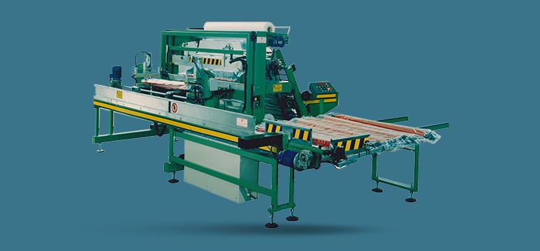 <span>B-1290/3S</span>: Imballatrice automatica per manici da scopa